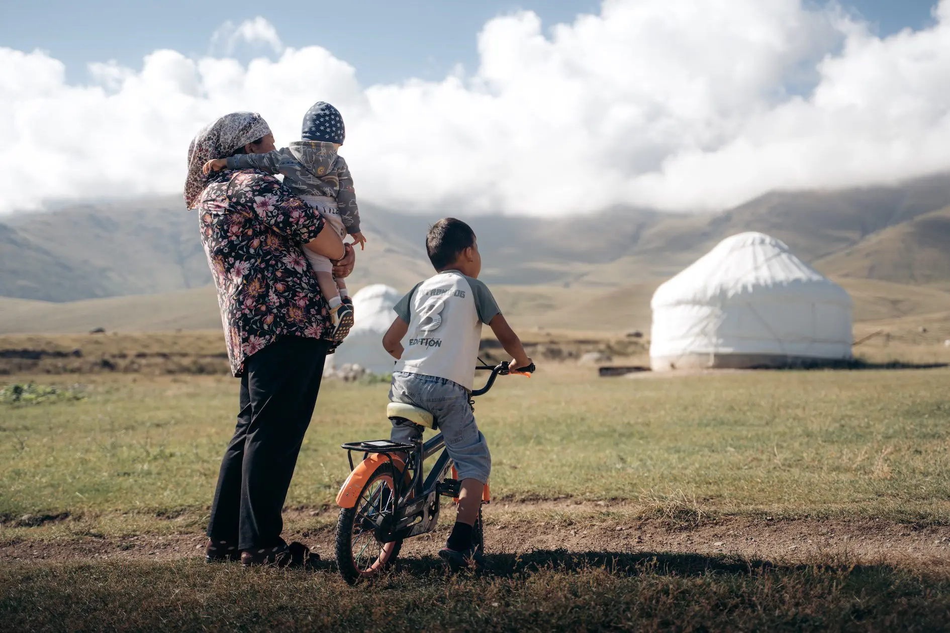 Family in front of their yurt in Song Kul